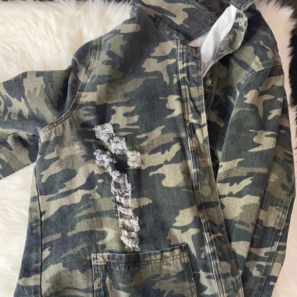Black body suit with a military green Jean jacket